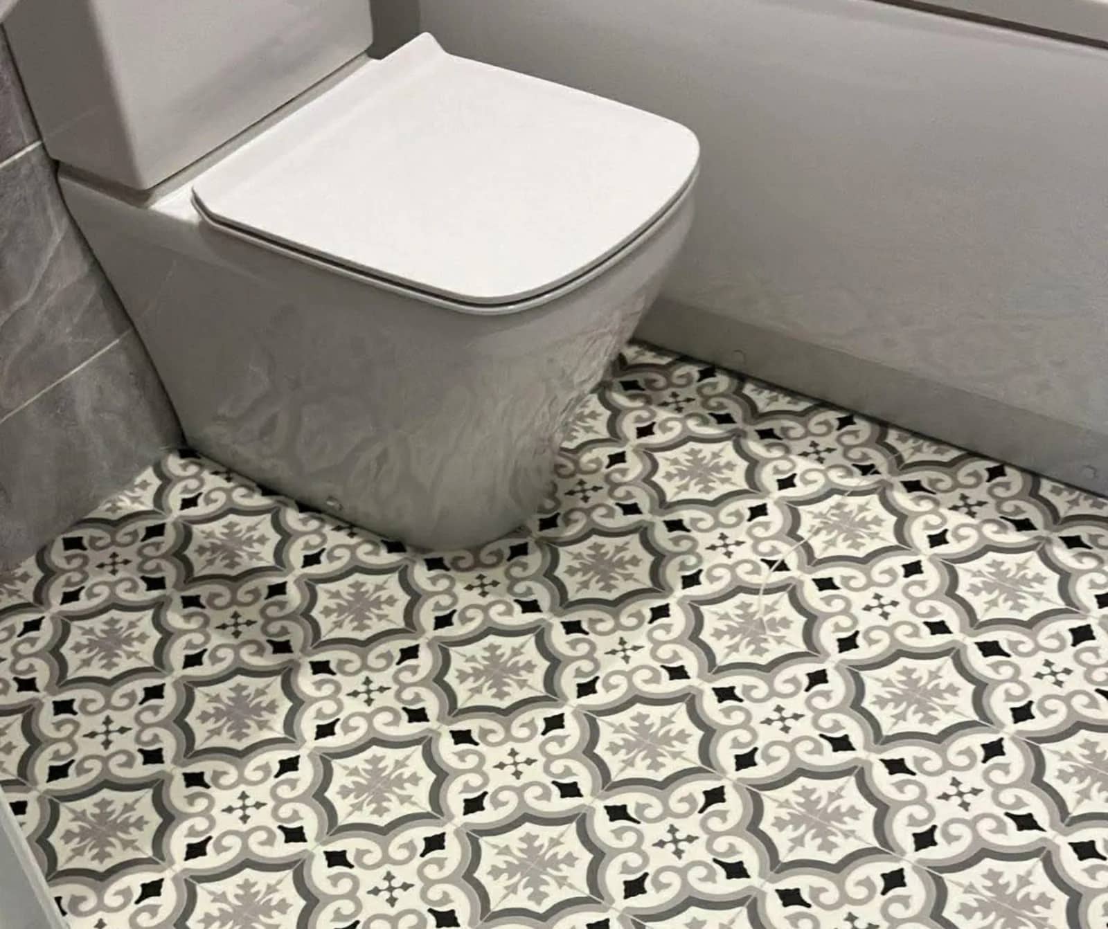 Patterned vinyl, cut and fitted around every awkward edge